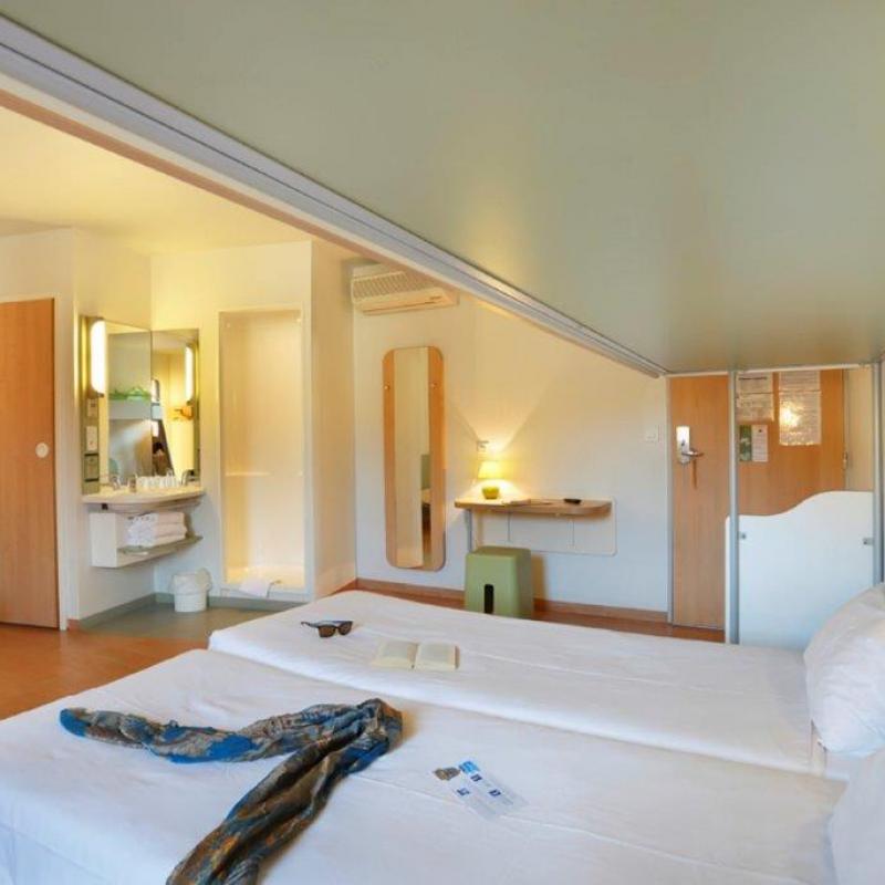 Hôtel First Inn Apt - chambre