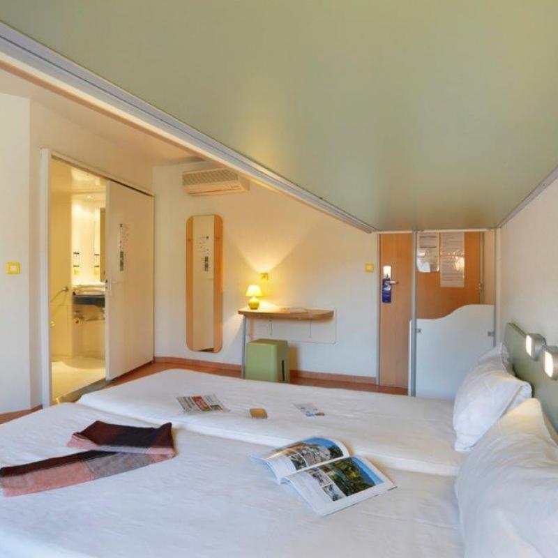 Hôtel First Inn Apt - chambre