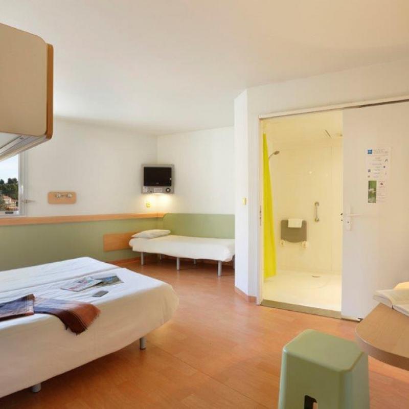 Hôtel First Inn Apt - chambre